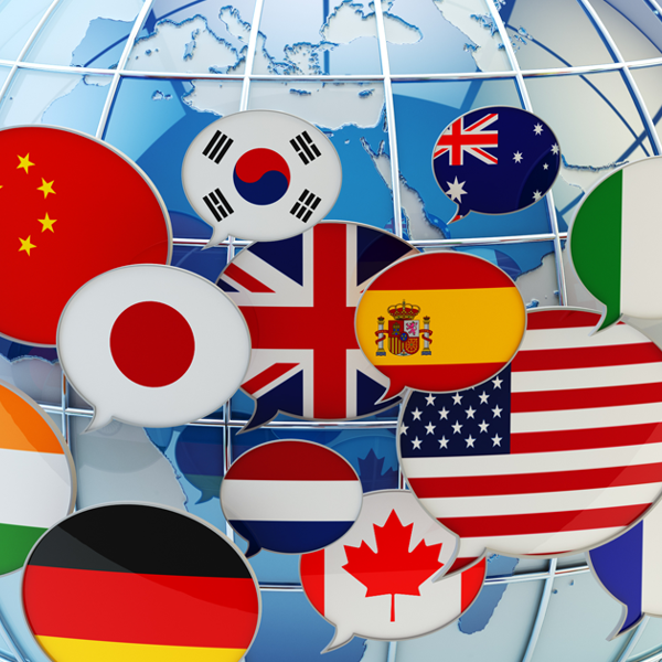 Image of the world surrounded by orbiting speech bubbles showing different flags