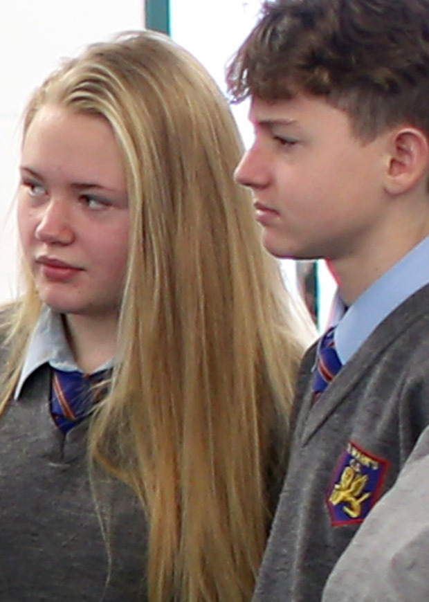 Close up of two students in uniforms