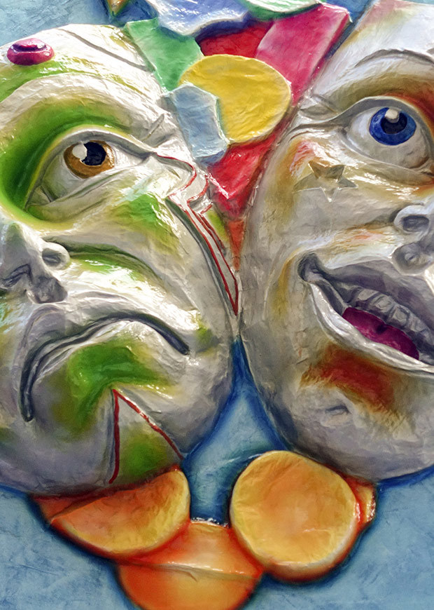 Ceramic wall masks, comedy and tragedy, portrait crop