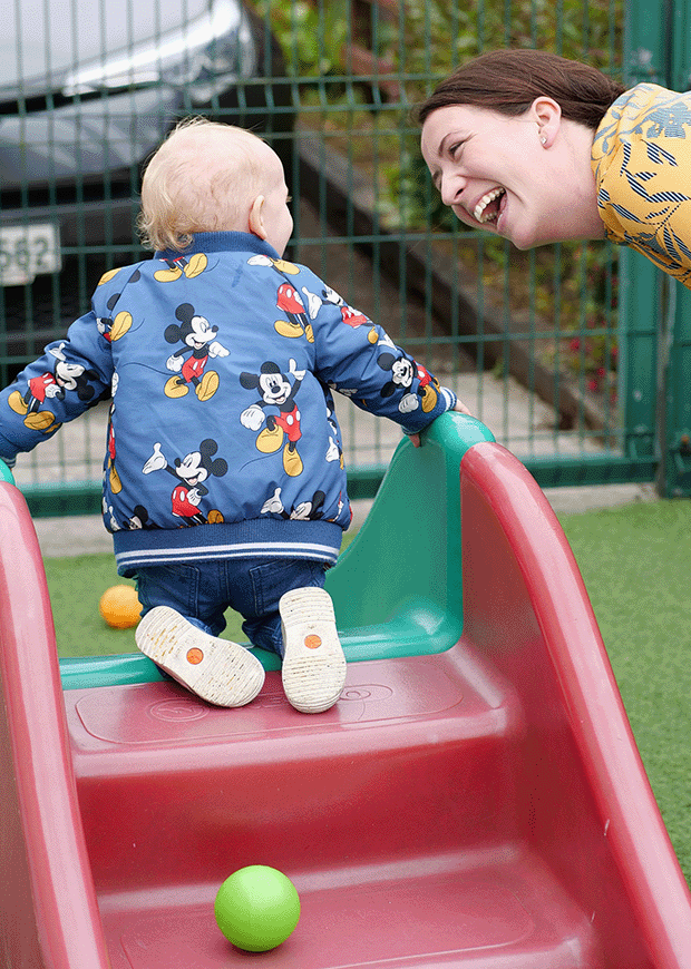 Adult playing with a child